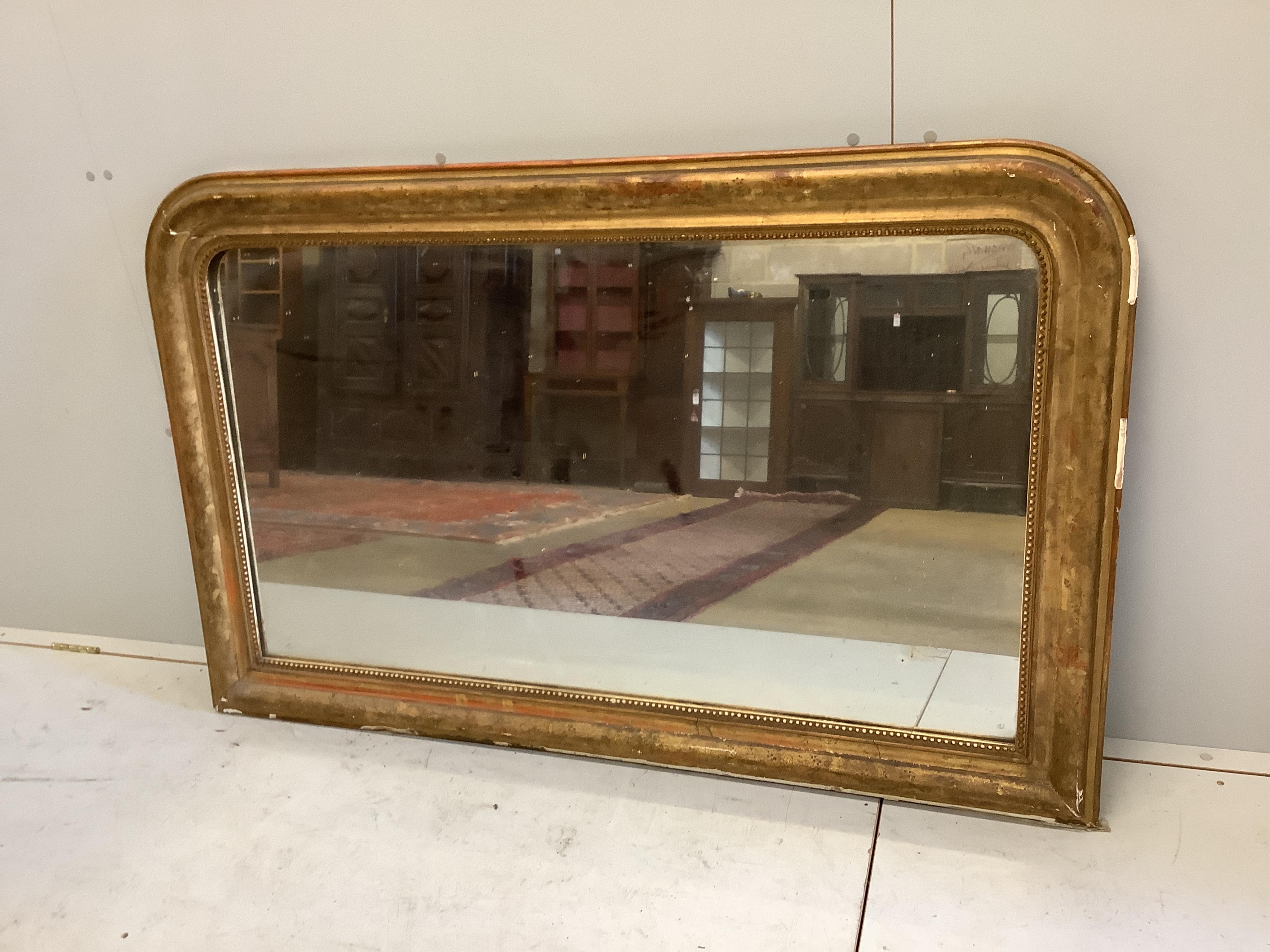 A late 19th century French giltwood and gesso overmantel mirror, width 144cm, height 90cm. Condition - poor, losses around frame and cracking